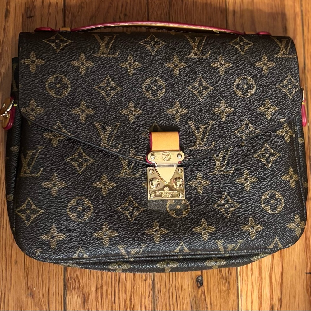 Pochette Métis Handbag